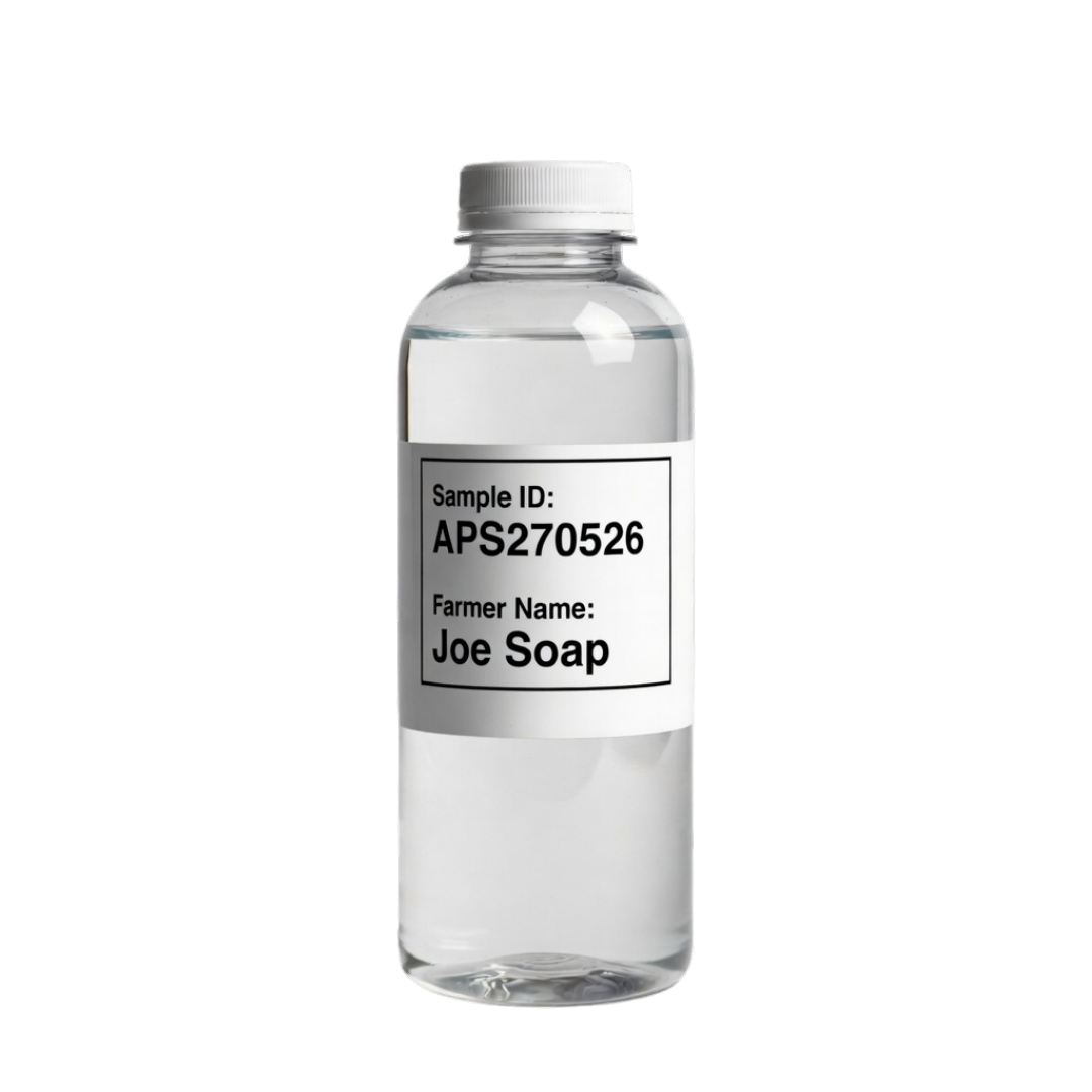 Clear bottle with a label on a black background