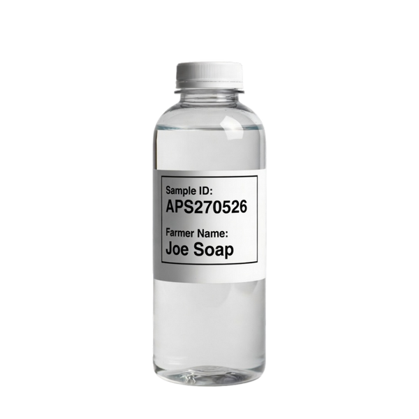 Clear bottle with a label on a black background